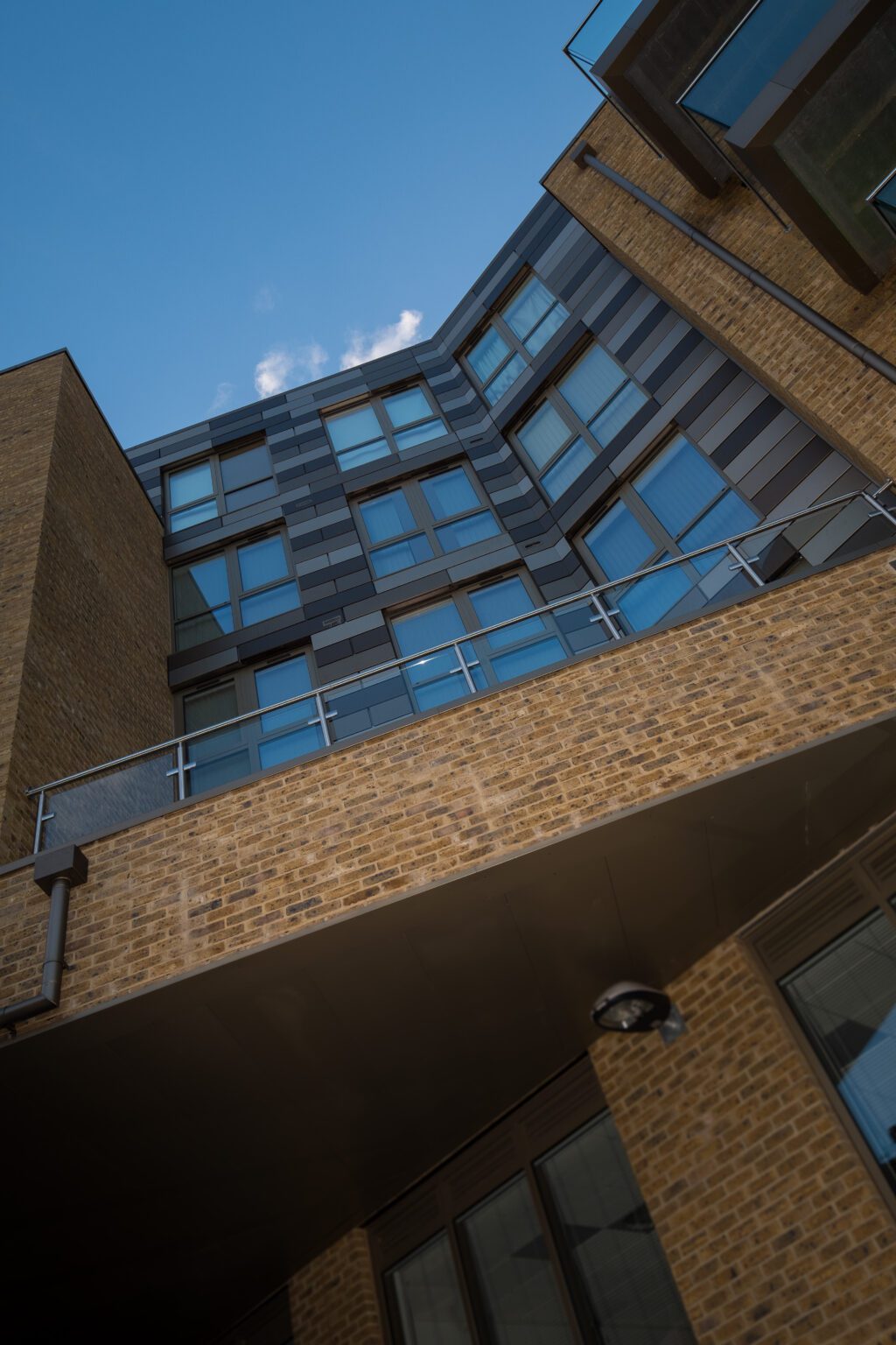 Exterior view of Neaco Clearview structural glass balconies on modern building, Clapham development