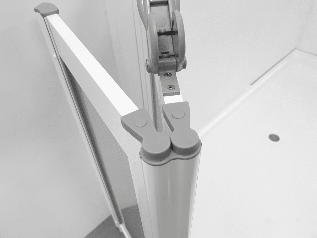 Close-up of a 360-degree hinge on a foldable shower door, designed for flexible and secure positioning.